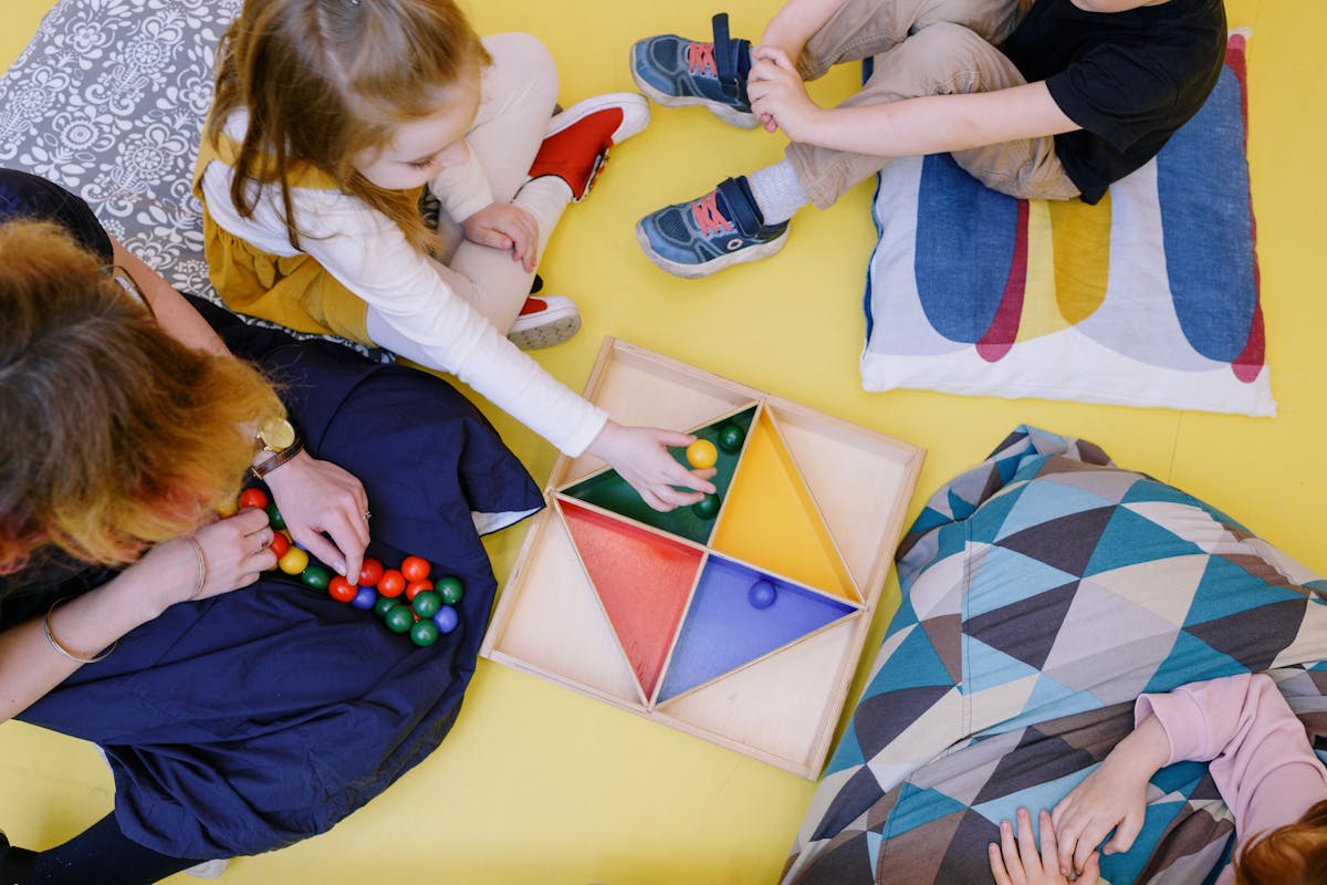 A bright, inclusive Australian play space with soft furniture and room for a child to move